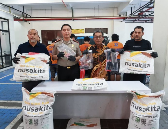 Polda Jatim Ungkap Dugaan Penipuan dan Penggelapan 185 Ton Gula, 11 Tersangka Diamankan